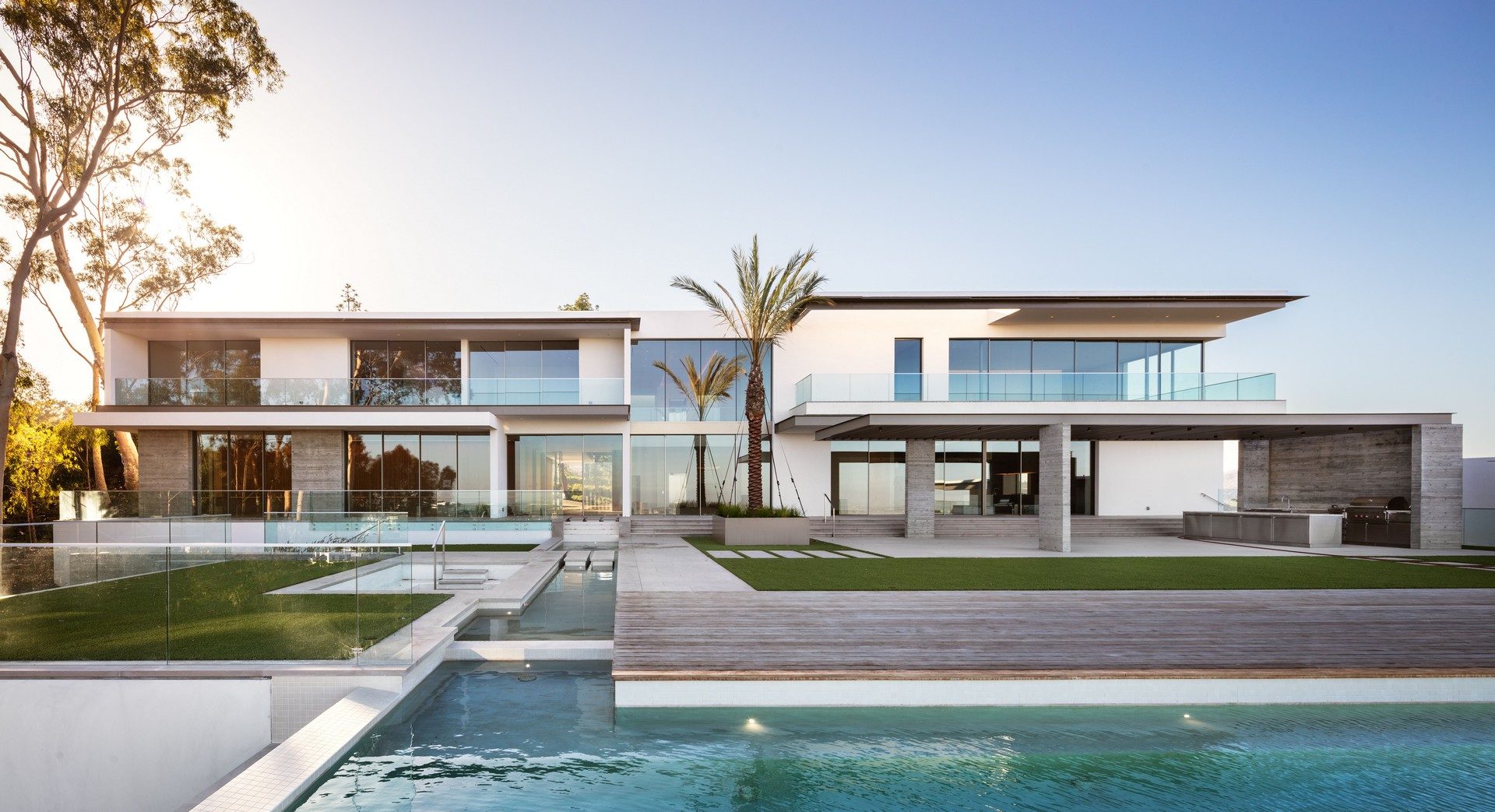 Luxury residence with minimal frame sliding doors and panoramic glass walls