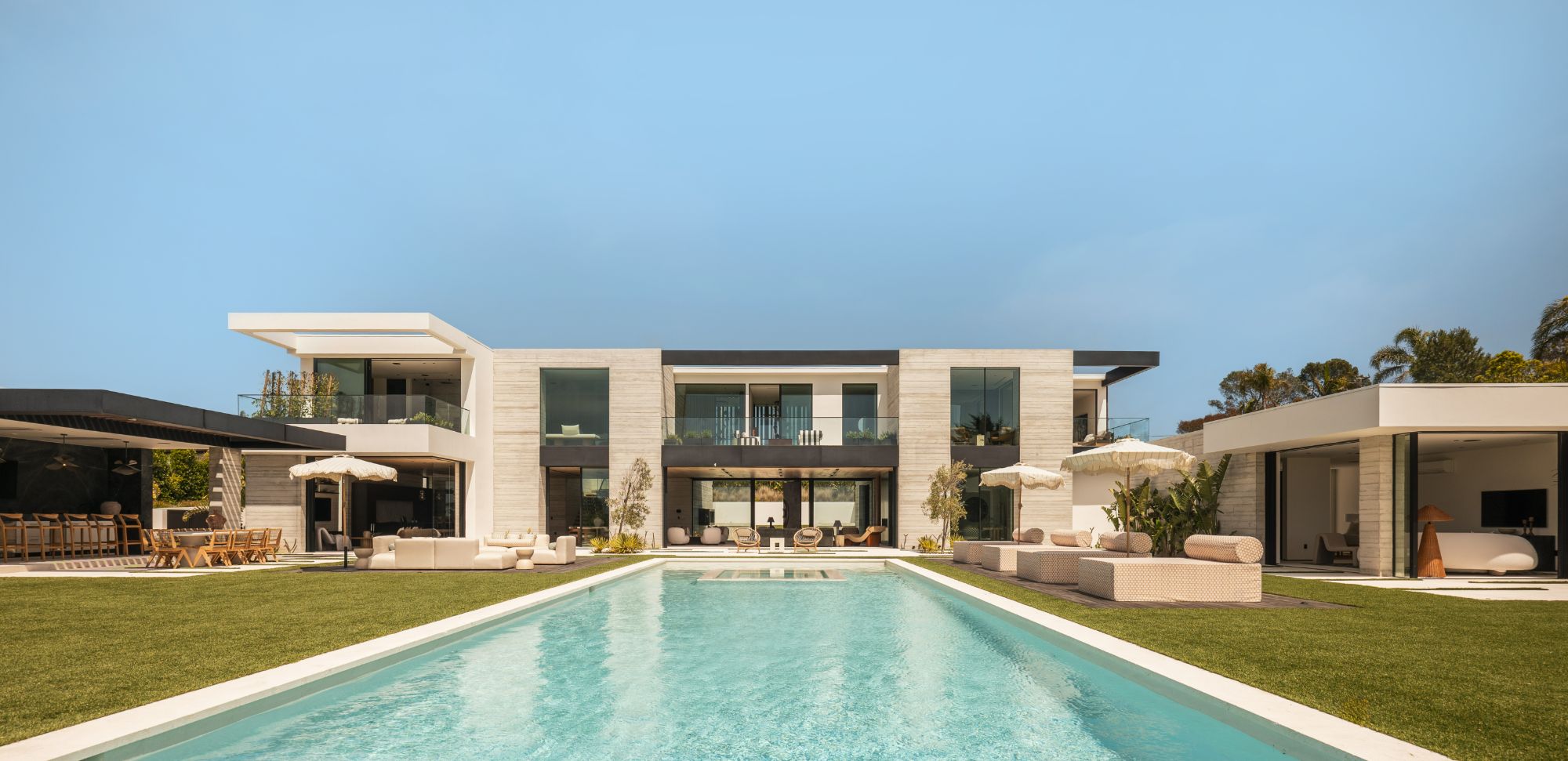 Monumental glass panel over 20 feet tall in luxury coastal residence with ocean views