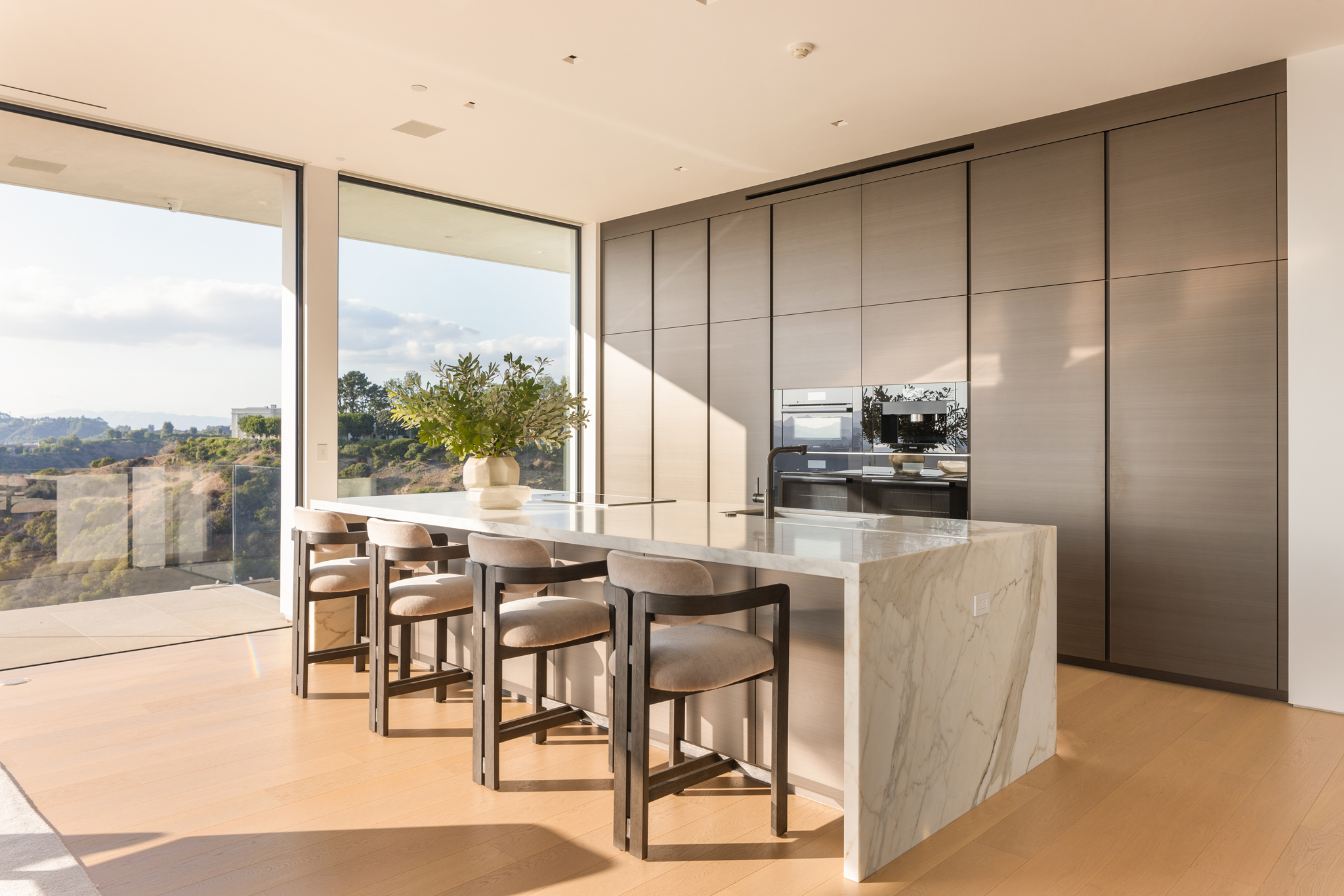 Expansive interior with Styline floor-to-ceiling glass panels and architectural details